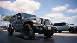 2021 Ford Bronco Outer Banks Four-Door 4x4 vs 2021 Jeep® Wrangler Unlimited Sahara 4x4. (ACCEL...jpg
